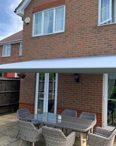 Retractable awning over patio