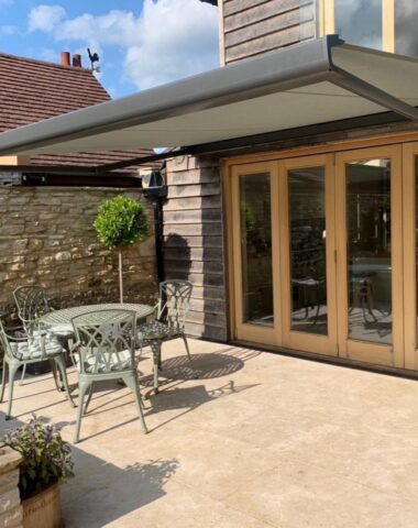 Retractable awning over patio