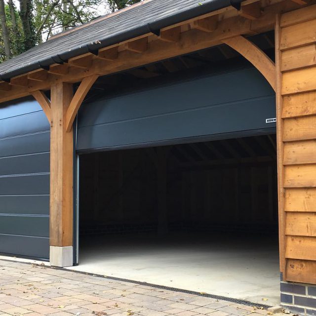 Double, black sectional garage doors