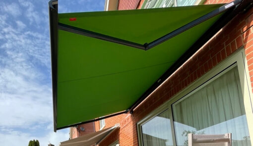 Green awning attached to a residential house. - Cyra Group Ltd
