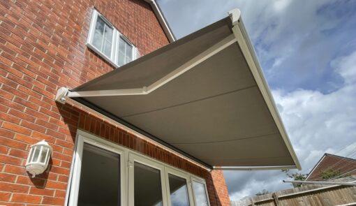 Dark grey awning. - Cyra Group Ltd