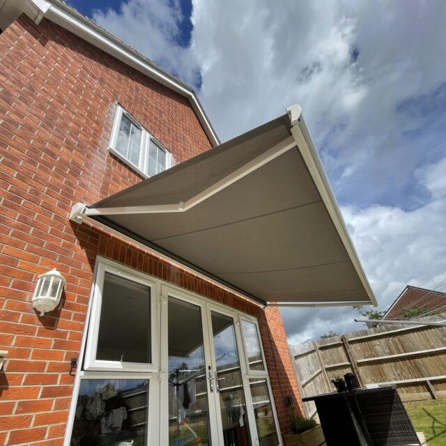Dark grey awning.
